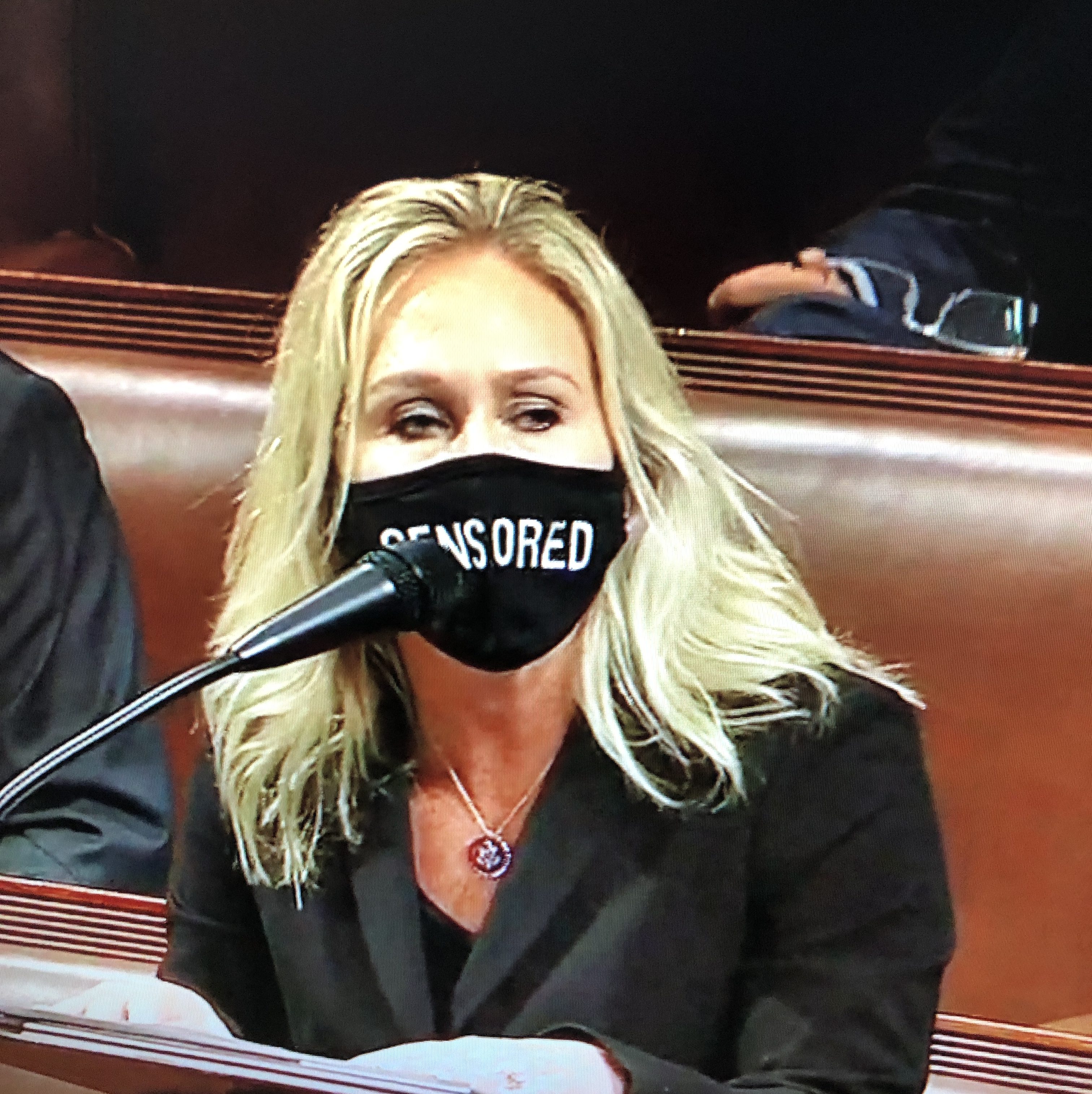 After social media accounts were restricted in the wake of the U.S. Capitol insurrection on January 6, Republican Congresswoman Marjorie Taylor Greene of Georgia wore a “Censored” mask while speaking on the floor of the House of Representatives. Hyphen Staff Photo